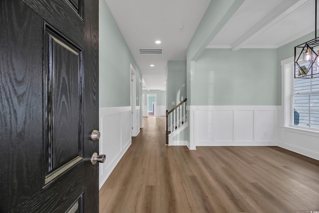 868 Crystal Water Way, Myrtle Beach, SC 29579 - foyer featuring wood finished floors, wainscoting, ornamental molding, stairs, and a decorative wall