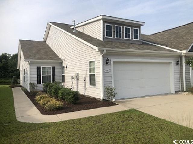 1835 Berkley Village Loop, Myrtle Beach, SC 29579 - view of side of home with driveway and a lawn