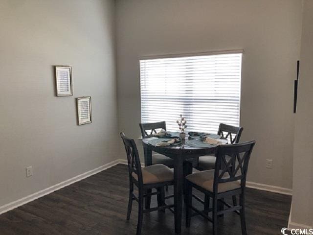 1835 Berkley Village Loop, Myrtle Beach, SC 29579 - dining room with dark wood-type flooring and baseboards