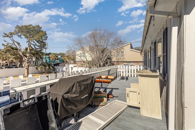view of wooden balcony with a deck