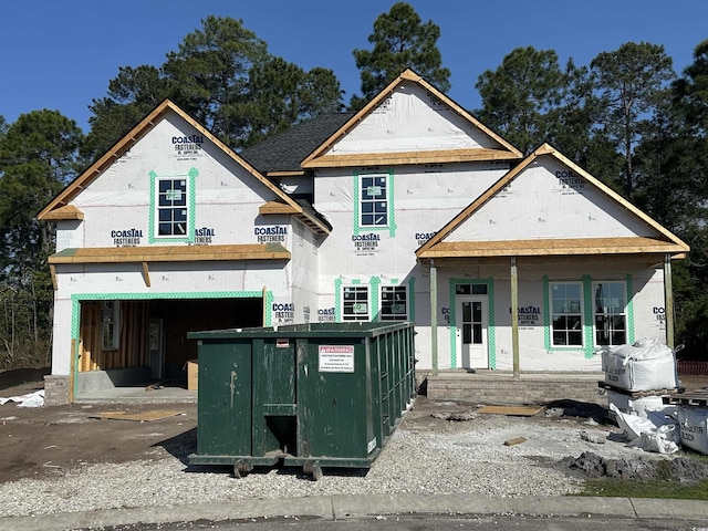 unfinished property with an attached garage