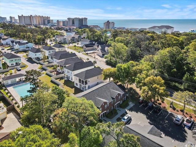 aerial view with a water view and a view of city