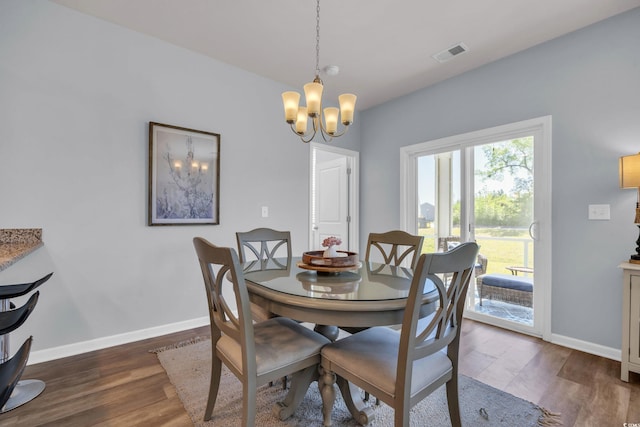 2771 Eclipse Dr, Myrtle Beach, SC 29577 - dining space featuring a chandelier and dark wood-type flooring