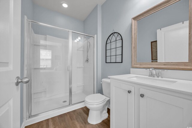2771 Eclipse Dr, Myrtle Beach, SC 29577 - bathroom featuring a shower stall, vanity, and wood finished floors