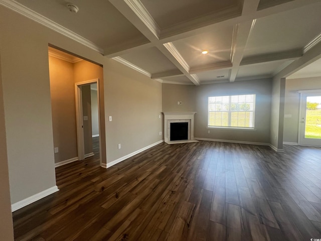 unfurnished living room with beamed ceiling, dark wood finished floors, coffered ceiling, a fireplace, and baseboards