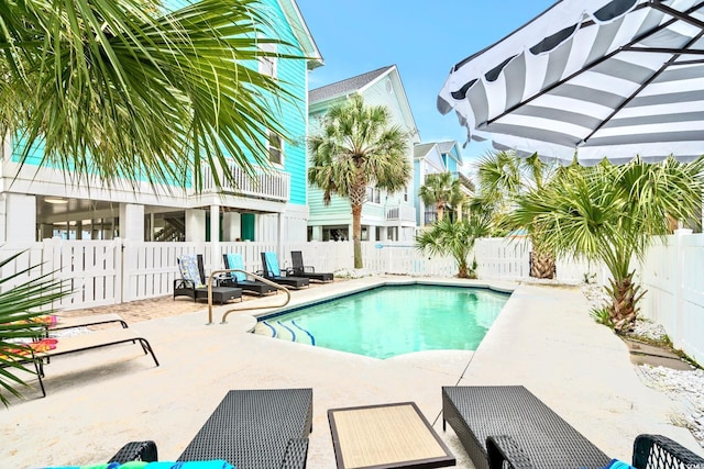 1010B S Ocean Blvd, Surfside Beach, SC 29575 - view of swimming pool featuring a patio area and a fenced backyard