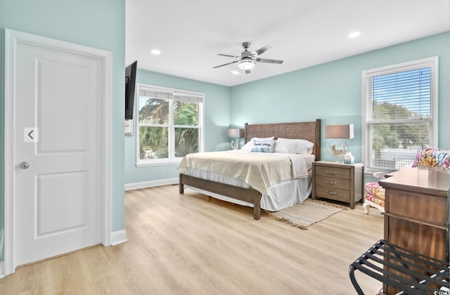 1010B S Ocean Blvd, Surfside Beach, SC 29575 - bedroom with light wood-type flooring, recessed lighting, and ceiling fan