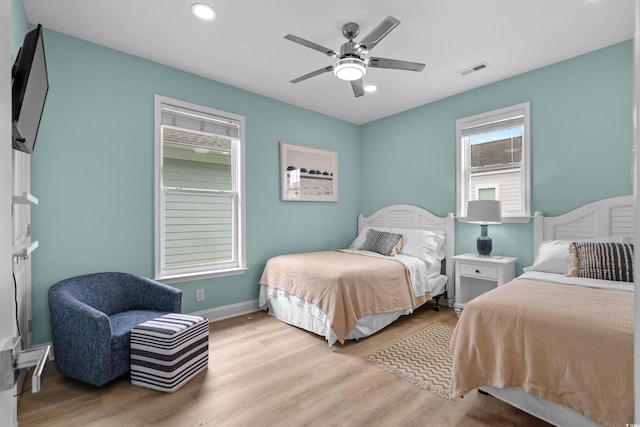 1010B S Ocean Blvd, Surfside Beach, SC 29575 - bedroom featuring light wood finished floors, recessed lighting, and a ceiling fan