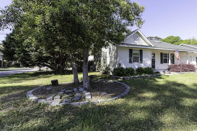 409 5th Ave S Unit 409, Surfside Beach, SC 29575 - view of front of home featuring a front lawn