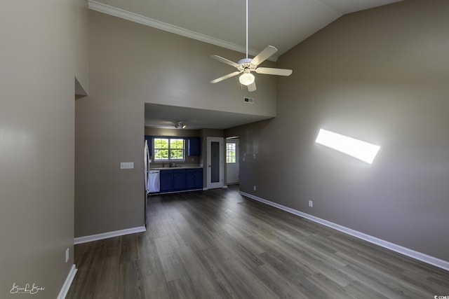 409 5th Ave S Unit 409, Surfside Beach, SC 29575 - unfurnished living room with high vaulted ceiling, a ceiling fan, baseboards, dark wood-style floors, and crown molding