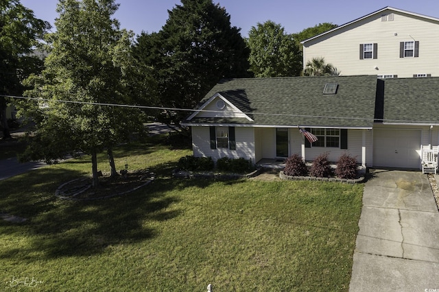 409 5th Ave S Unit 409, Surfside Beach, SC 29575 - single story home featuring a shingled roof, a front yard, concrete driveway, and an attached garage