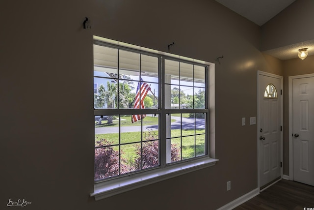 409 5th Ave S Unit 409, Surfside Beach, SC 29575 - foyer entrance with dark wood-style floors and baseboards