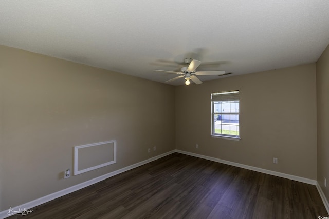 409 5th Ave S Unit 409, Surfside Beach, SC 29575 - spare room with dark wood finished floors, baseboards, and a ceiling fan