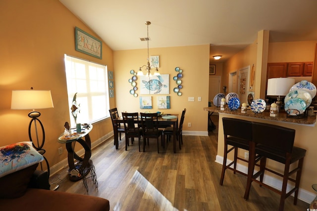 110 Portsmith Dr Unit 8, Myrtle Beach, SC 29588 - dining area with dark wood finished floors, baseboards, and vaulted ceiling
