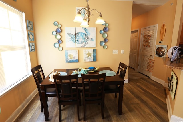 110 Portsmith Dr Unit 8, Myrtle Beach, SC 29588 - dining area featuring wood finished floors, a chandelier, healthy amount of natural light, and baseboards