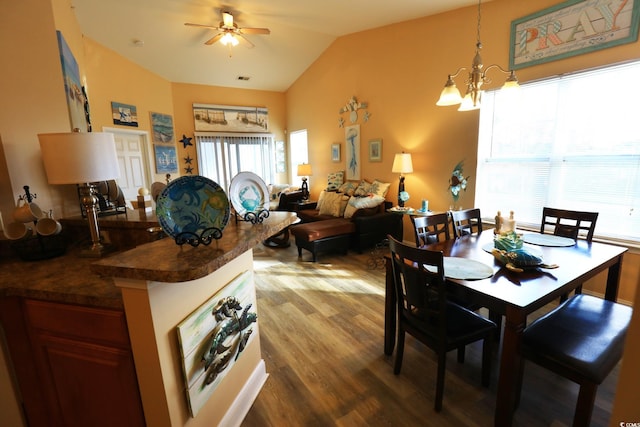 110 Portsmith Dr Unit 8, Myrtle Beach, SC 29588 - dining space featuring wood finished floors, lofted ceiling, a chandelier, and a ceiling fan