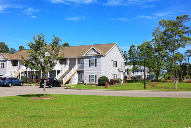 110 Portsmith Dr Unit 8, Myrtle Beach, SC 29588 - view of front of house with stairway and a front yard