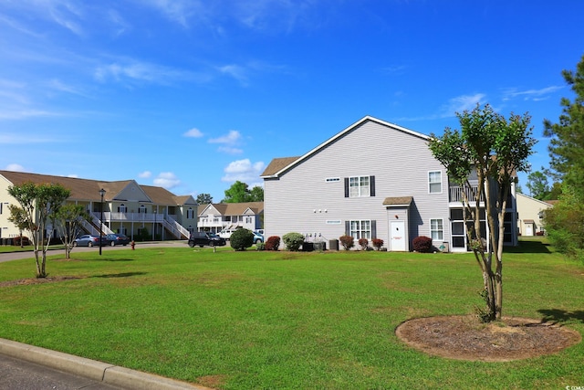 110 Portsmith Dr Unit 8, Myrtle Beach, SC 29588 - view of side of home with a yard and a residential view
