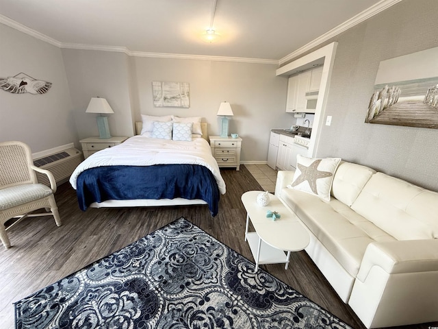 2001 S Ocean Blvd S Unit 511, Myrtle Beach, SC 29577 - bedroom with baseboards, ornamental molding, and wood finished floors