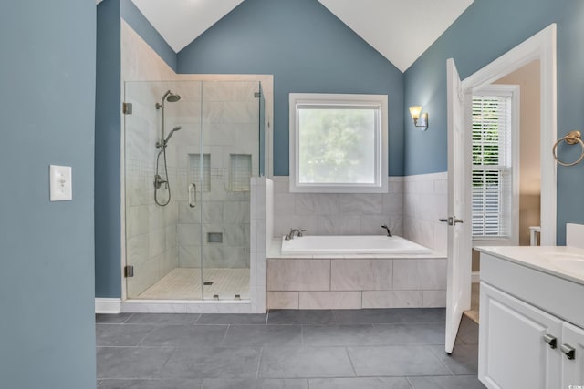 3300 Prioloe Dr, Myrtle Beach, SC 29588 - bathroom featuring a bath, vanity, a shower stall, tile patterned flooring, and lofted ceiling