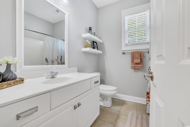 full bathroom featuring tile patterned flooring, vanity, baseboards, toilet, and a shower with shower curtain