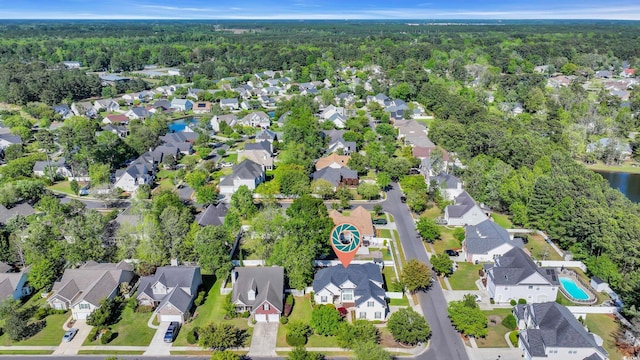 aerial view with a residential view and a forest view