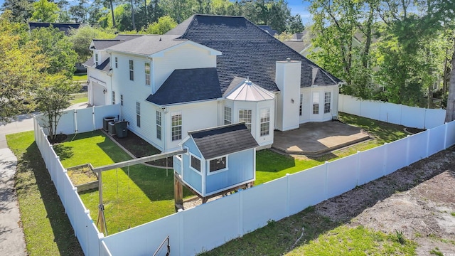 3300 Prioloe Dr, Myrtle Beach, SC 29588 - view of property exterior with a shingled roof, a patio, and a fenced backyard