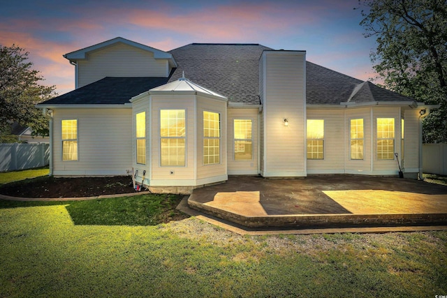 3300 Prioloe Dr, Myrtle Beach, SC 29588 - back of property at dusk with a chimney and a shingled roof