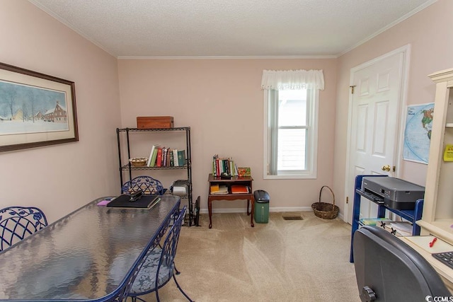 home office with light colored carpet, baseboards, crown molding, and a textured ceiling