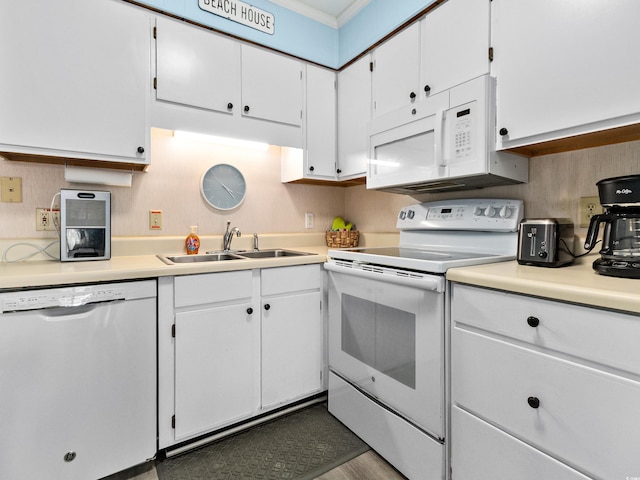 5000 N Ocean Blvd Unit B-1, North Myrtle Beach, SC 29582 - kitchen featuring a sink, white cabinets, white appliances, and light countertops