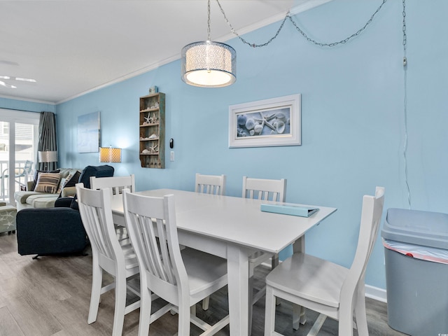 5000 N Ocean Blvd Unit B-1, North Myrtle Beach, SC 29582 - dining room with crown molding and wood finished floors