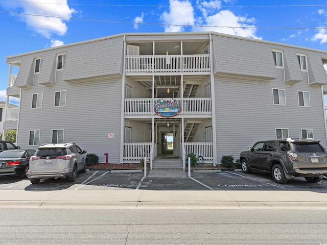 5000 N Ocean Blvd Unit B-1, North Myrtle Beach, SC 29582 - view of building exterior featuring uncovered parking