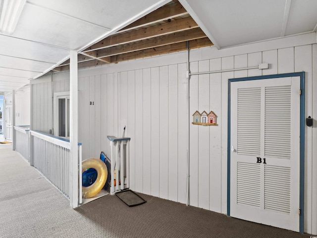 5000 N Ocean Blvd Unit B-1, North Myrtle Beach, SC 29582 - interior space with wooden walls and carpet