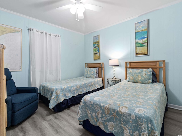 5000 N Ocean Blvd Unit B-1, North Myrtle Beach, SC 29582 - bedroom with ornamental molding, ceiling fan, and wood finished floors
