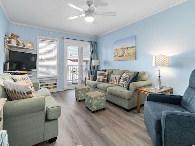 5000 N Ocean Blvd Unit B-1, North Myrtle Beach, SC 29582 - living area featuring a ceiling fan, ornamental molding, and wood finished floors