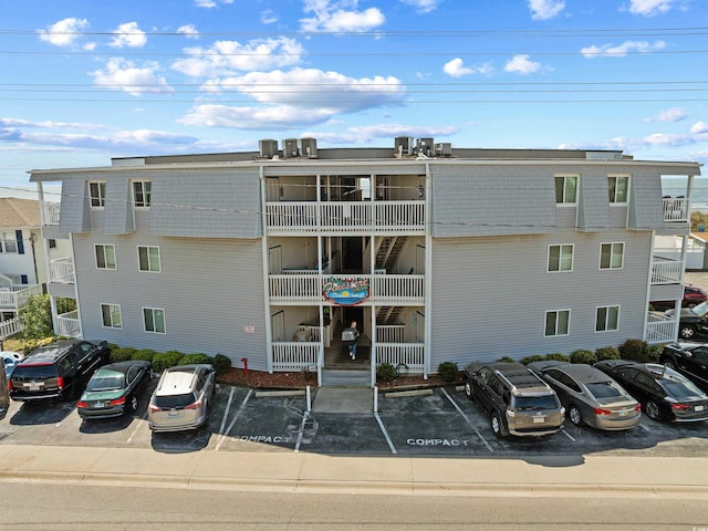 5000 N Ocean Blvd Unit B-1, North Myrtle Beach, SC 29582 - view of building exterior featuring uncovered parking
