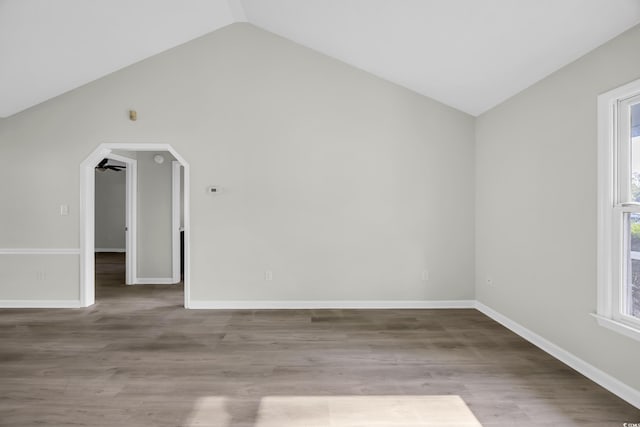 202 Berkshire Dr, Myrtle Beach, SC 29588 - additional living space featuring lofted ceiling, wood finished floors, baseboards, and arched walkways
