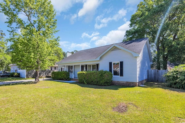 202 Berkshire Dr, Myrtle Beach, SC 29588 - ranch-style home featuring fence, a porch, a front lawn, and roof with shingles