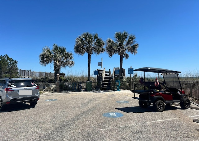 147 Marsh Deer Pl, Surfside Beach, SC 29575 - uncovered parking lot with fence