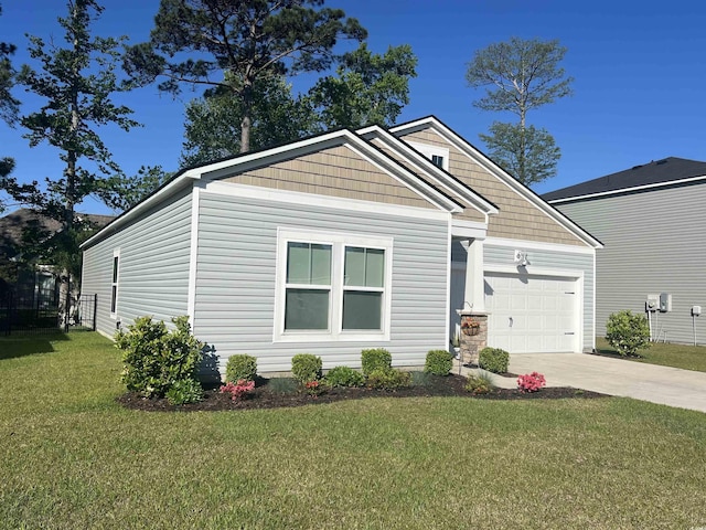 147 Marsh Deer Pl, Surfside Beach, SC 29575 - craftsman-style home with a garage, driveway, and a front yard