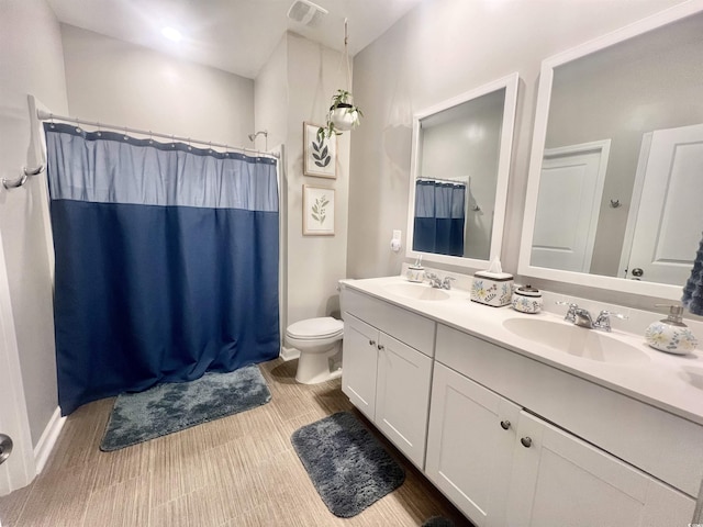 147 Marsh Deer Pl, Surfside Beach, SC 29575 - bathroom with toilet, double vanity, a shower with curtain, and wood finished floors