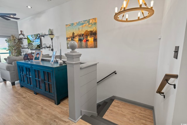 19 Red Skiff Ln Unit 15, Pawleys Island, SC 29585 - staircase with wood finished floors, a chandelier, a ceiling fan, and recessed lighting