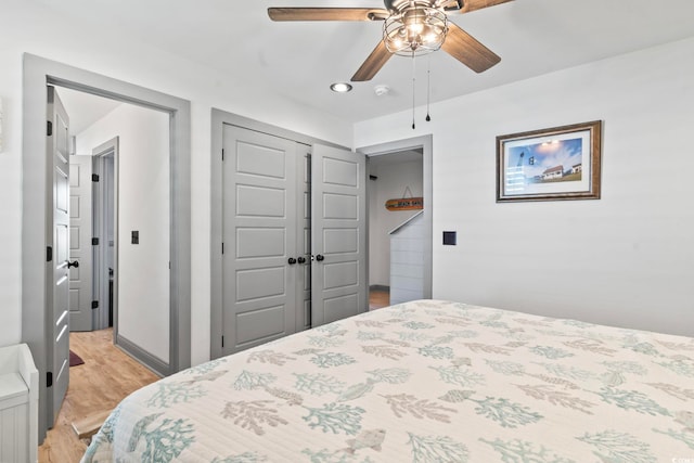19 Red Skiff Ln Unit 15, Pawleys Island, SC 29585 - bedroom featuring light wood-type flooring, a closet, recessed lighting, and ceiling fan