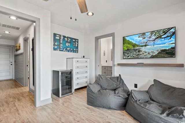 19 Red Skiff Ln Unit 15, Pawleys Island, SC 29585 - living area featuring beverage cooler, light wood finished floors, ceiling fan, and recessed lighting