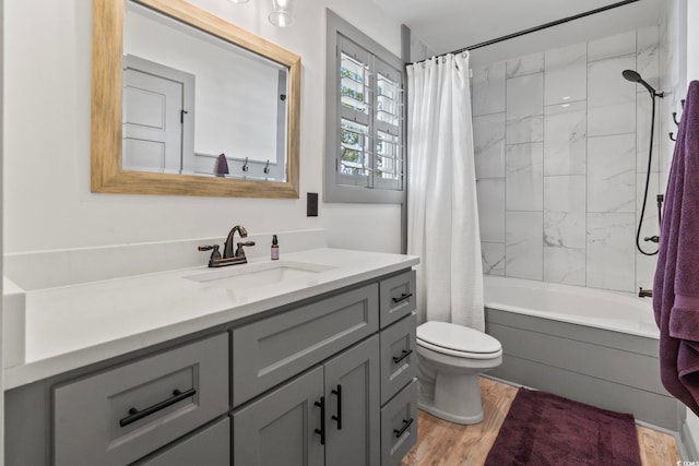 19 Red Skiff Ln Unit 15, Pawleys Island, SC 29585 - bathroom featuring vanity, shower / bathtub combination with curtain, and wood finished floors