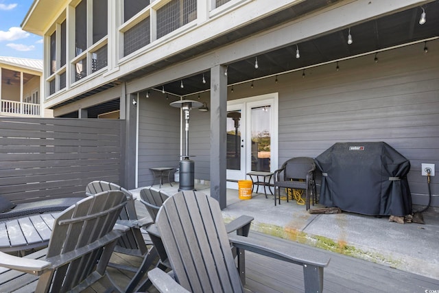 19 Red Skiff Ln Unit 15, Pawleys Island, SC 29585 - wooden terrace with area for grilling, a patio, and french doors