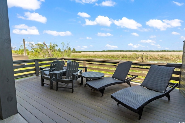 19 Red Skiff Ln Unit 15, Pawleys Island, SC 29585 - wooden deck featuring a view of countryside