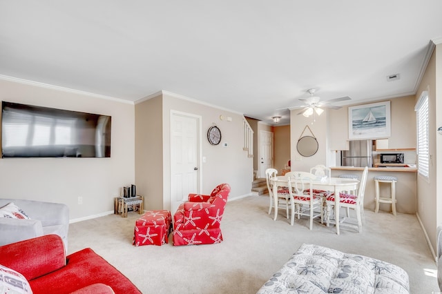 4504 S Ocean Blvd Unit A, North Myrtle Beach, SC 29582 - living area with baseboards, ornamental molding, carpet, and ceiling fan