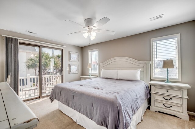 4504 S Ocean Blvd Unit A, North Myrtle Beach, SC 29582 - bedroom featuring light colored carpet, visible vents, and access to outside