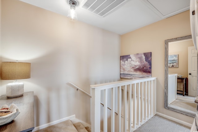 4504 S Ocean Blvd Unit A, North Myrtle Beach, SC 29582 - stairs with baseboards, visible vents, and carpet